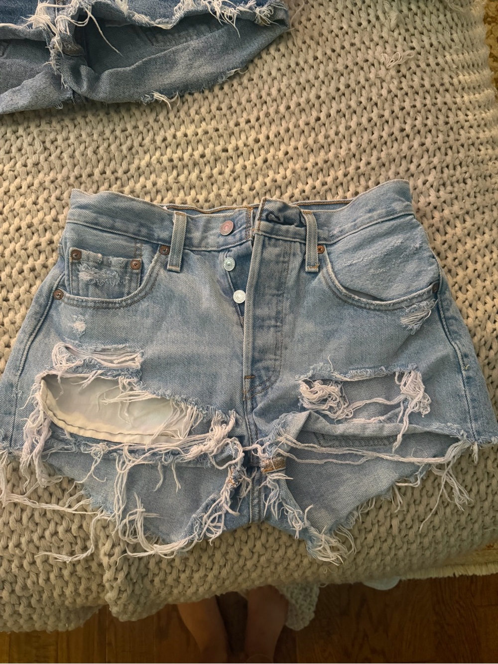 Levi's Light Blue Distressed High-Rise Jean Shorts